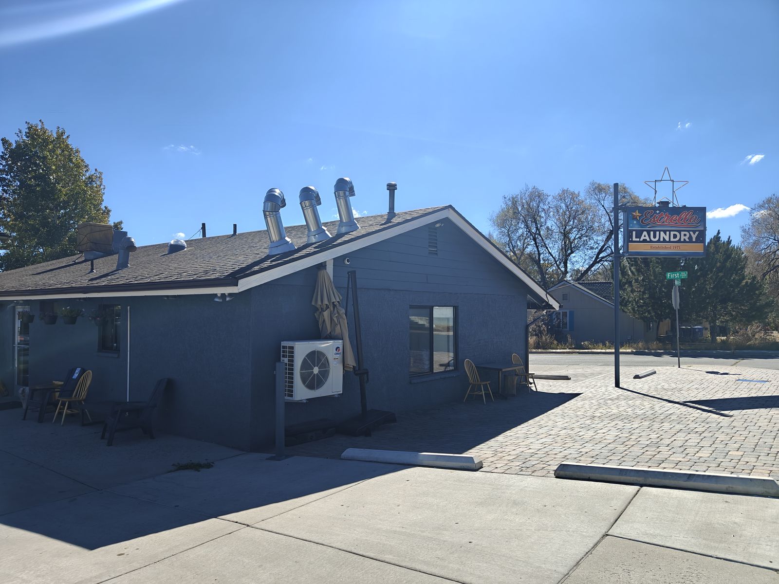 Estrella Laundry building and sign at the First St corner